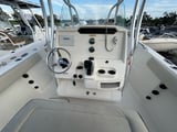Boat helm with steering wheel and dashboard